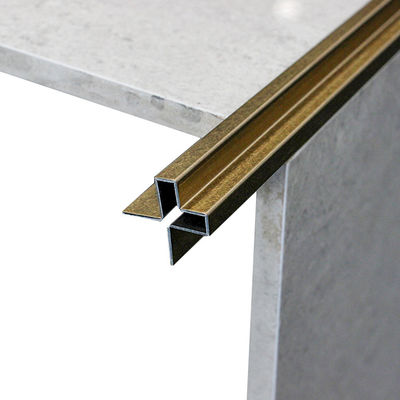 Disposizione delle mattonelle del bordo della parete di acciaio inossidabile del film del PVC del grado 304 della striscia delle mattonelle della decorazione